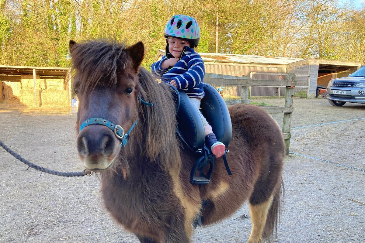 Child on Shetland pony — Elsie and Arnold at Golden Lane Stables